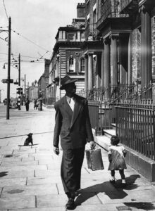 2nd July 1949: A West Indian immigrant looking for accommodation at Upper Parliament street, Liverpool.